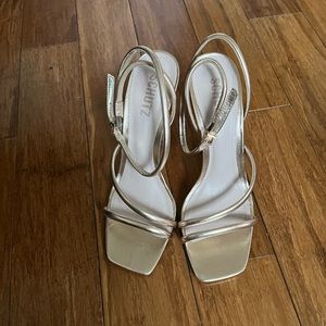 Schutz gold heels